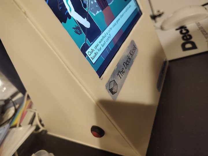 Side-front view of deck kiosk showing the side power button