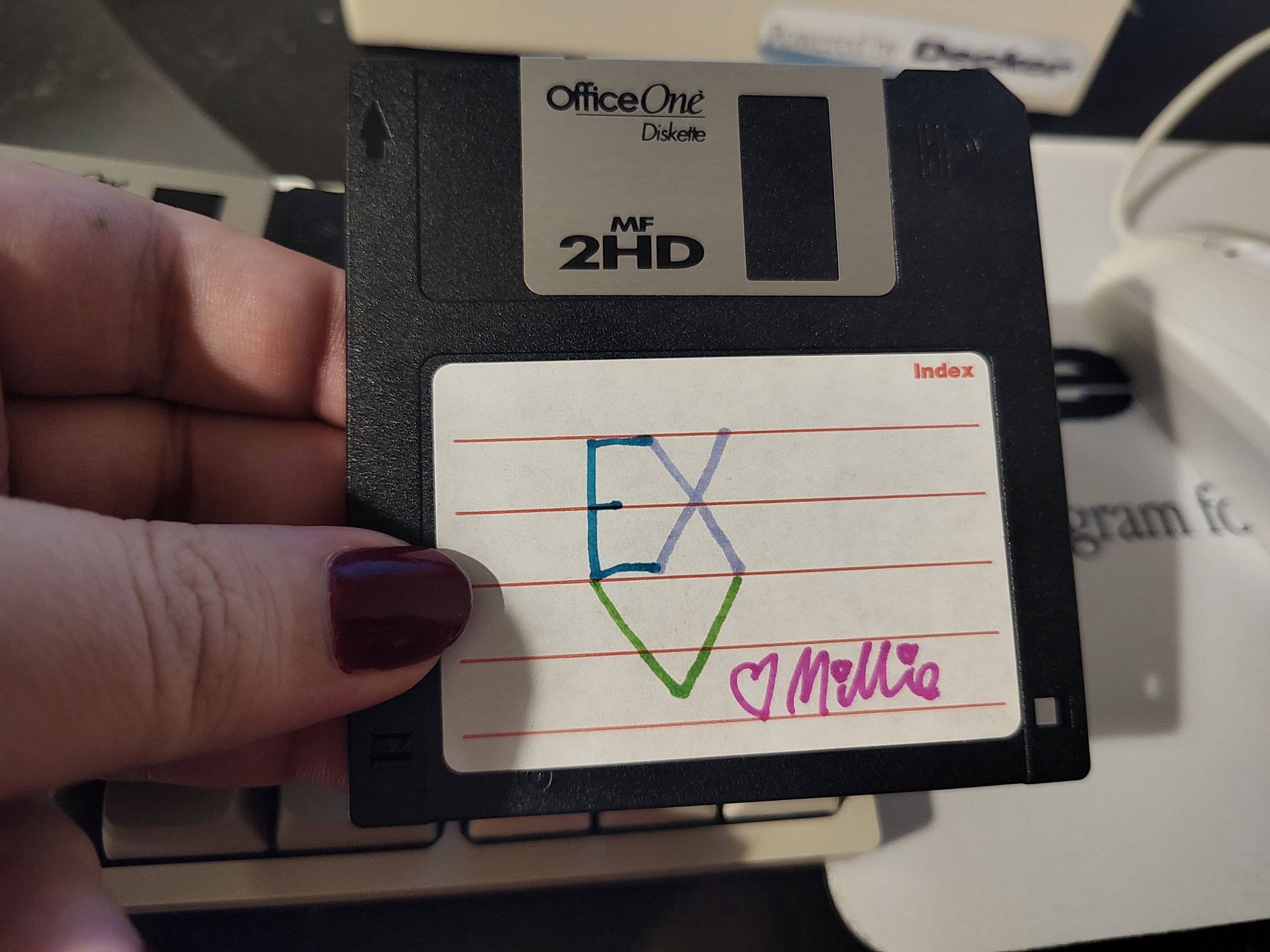 EXV <3 Millie on a floppy disk