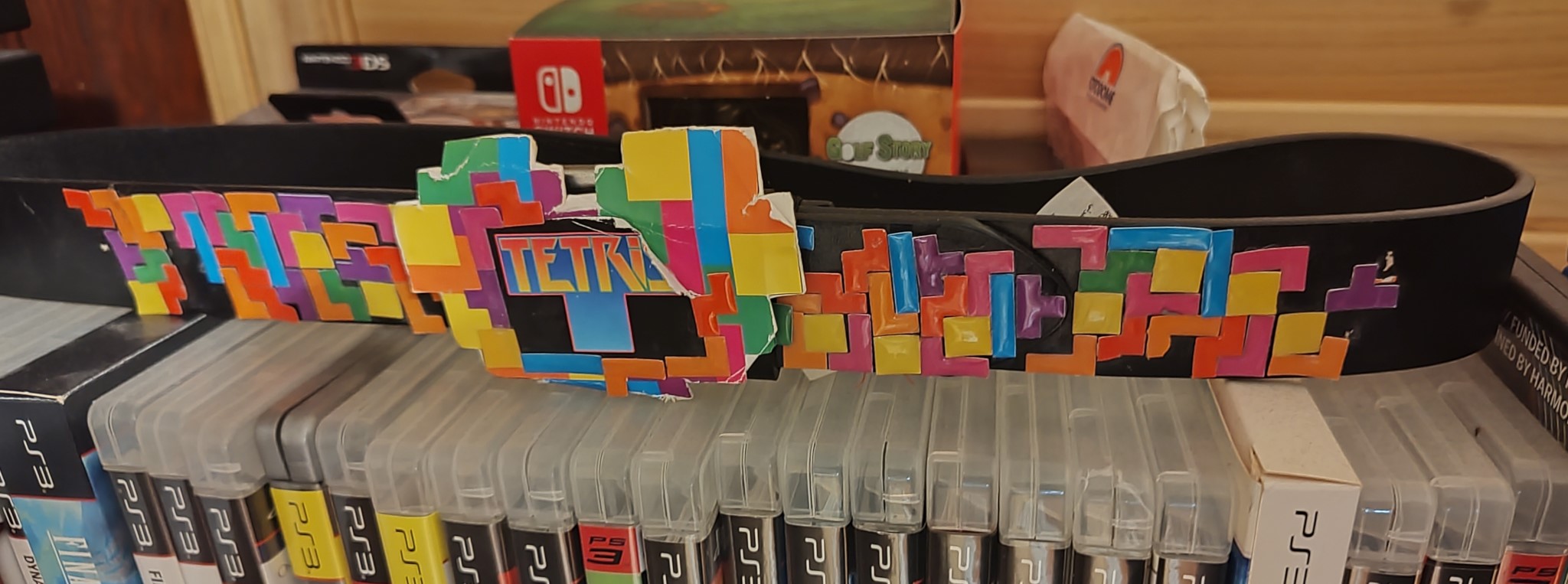 A belt with Tetris bits stuck to it